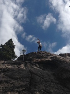 Emily rock climbing.